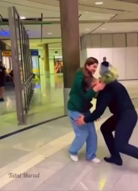 A Yazidi man cries as he meets his sister for the first time in over a decade after she was kidnapped by ISIS as a young girl