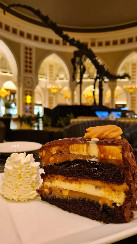 Cheesecake is best enjoyed with a dinosaur in the background