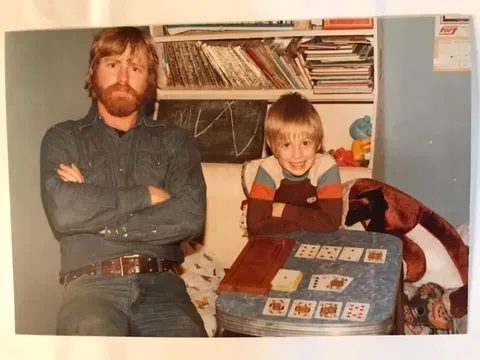 1980s When I was little, my father taught me to play card games like poker and cribbage so I would learn more about math. Here I am with a rare victory. Love you, Dad. 