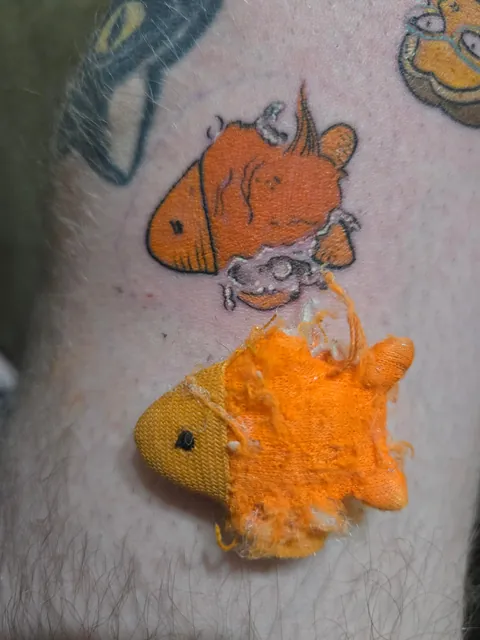 Got my cats favorite toy tattooed yesterday. Melanie Wayland / Stratford Ontario / Brindle Boy Tattoo