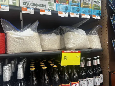 This grocery store is selling rice that they portioned into individual resealable bags.