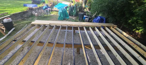 Replaced the deck that was falling apart when I bought the house, and decided to go bigger