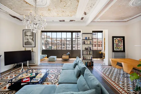 Spacious living spaces with original Modernist hydraulic tile floors in a renovated apartment, Eixample, Barcelona, Spain [1600x1067]