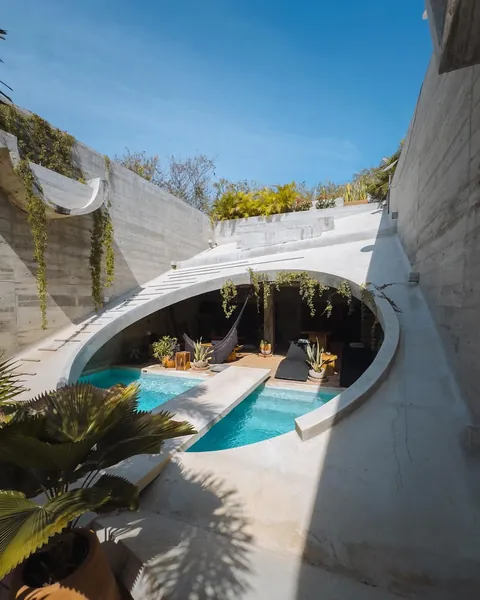 Casa Hezbo by French architect Ludwig Godefroy embraces a bold Brutalist aesthetic while blending indoor-outdoor living in Puerto Escondido.