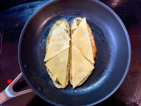 Mozzarella, tomato, and pesto melt on [homemade] bread