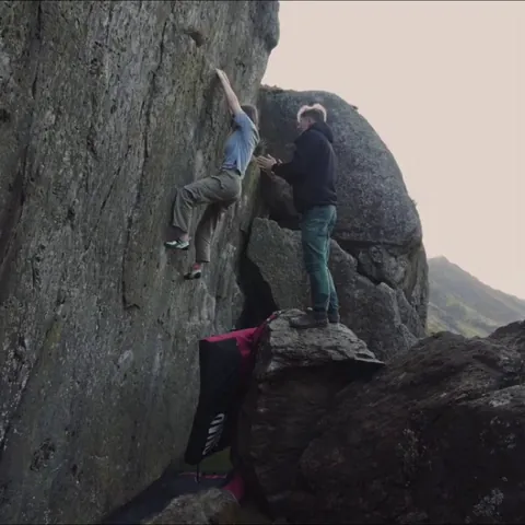Wearing crocs on a slippy cliff