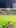 A kid pitch invades at an Australian Rules Football game and out runs security