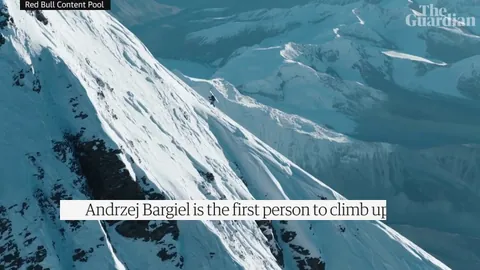 Polish skier becomes first person to climb Everest and ski down without extra oxygen