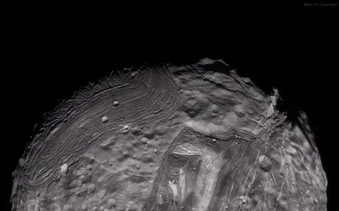Stunning image of Miranda, the oddly shaped Moon of Uranus. This moon has the tallest known cliff in the Solar System, Verona Rupes which stands at 20km tall. 