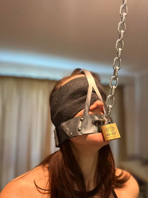 Dressed up like a good little slut, locked in chastity, made to wear a scolds’s bridle with spikes and strung up like a piece of meat.