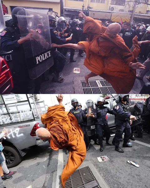 Monks clashing with police in Bangkok riots, November 2022