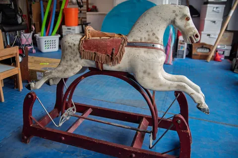 My grandpa riding a rocking horse ca. 1912, me riding the same horse in 1974, and a current photo of the rocking horse as it looks today.