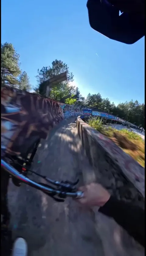 Matt Jones riding down an abandoned bobsled track