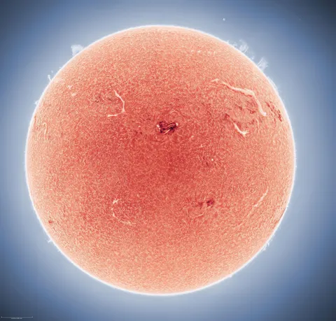 My most detailed image of the sun to date, captured using over 100,000 individual photos from my backyard in Arizona. Earth for scale. [OC]