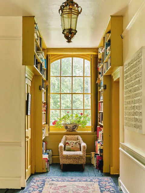 Bright yellow reading nook in a Georgian country house, Kent, South East England [3749x5000]