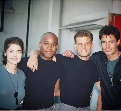 Denise Richards, Seth Gilliam, Casper Van Dien and Patrick Muldoon on the set of Starship Troopers, 1996