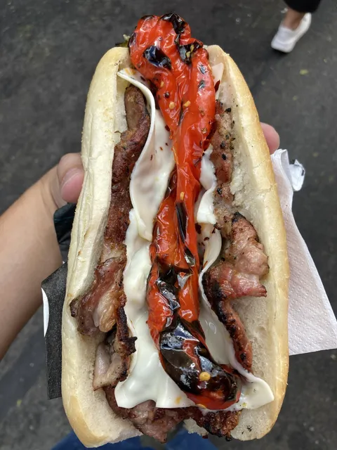 [I ate] this grilled pork, cheese, and pepper sandwich