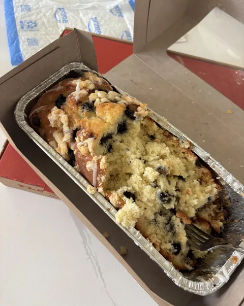 enjoying a blueberry lemon loaf “irrationally” and “aggressively” according to some ppl