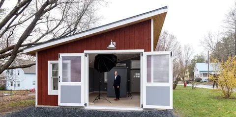 I built a 500 sq ft backyard shed studio for my photography business. I personally handled every phase from design to completion except for concrete, electrical, and HVAC. It's insulated and comfortable year round here in New Hampshire.  Ask me anything!