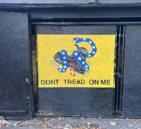 New Gadsden, Topsy, spray paint on wall, 2025