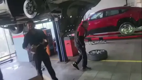 Mechanics paused their work to save three kittens trapped inside a car. Car came in for scheduled service.