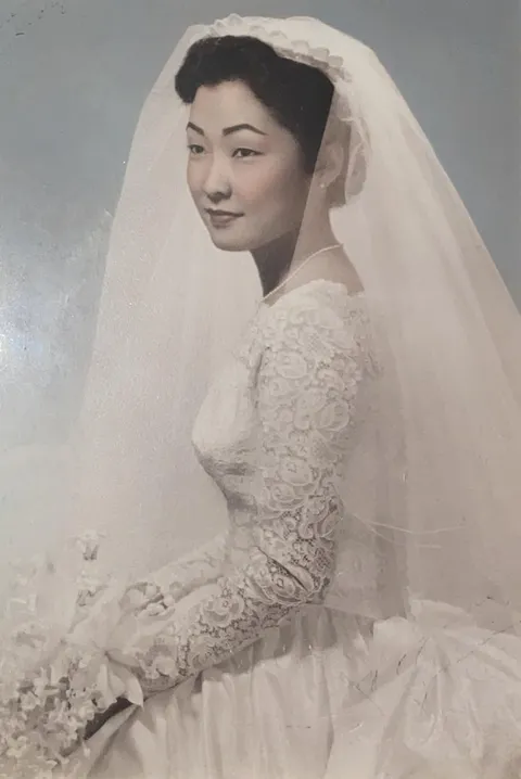 My third generation Japanese-American (Sansei) grandmother in her wedding gown (1950s)