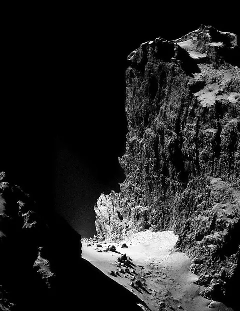 This is a cliff. That's a kilometre tall. On comet 67P/Churyumov-Gerasimenko taken by ESA's Rosetta mission in 2014.