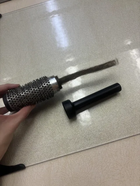 Hairbrush broke and revealed weird hair formation inside 