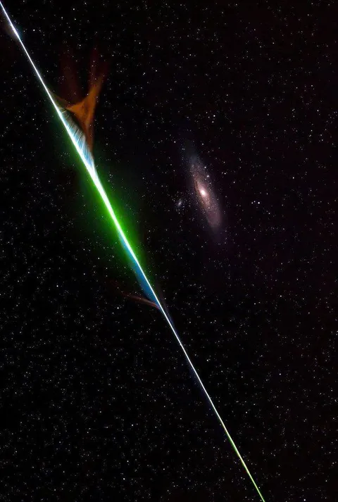 Rare shot: Bright meteorite caught in telescope lens while capturing of Andromeda Galaxy .