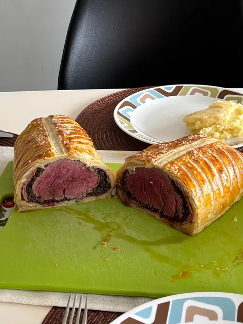 [homemade] My first attempt at a Beef Wellington. Let me know what you think!