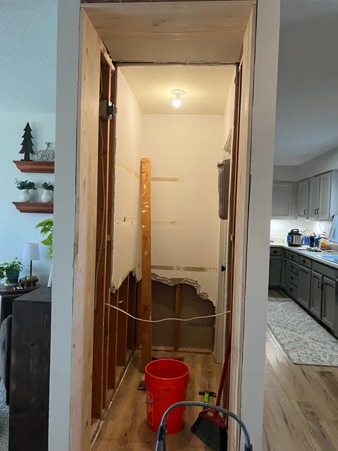 Reclaimed unused coat closet for pantry expansion
