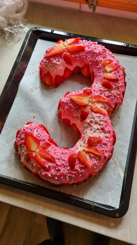 Daughter wanted a pink birthday cake with strawberries. Filling is custard and strawberry jam.