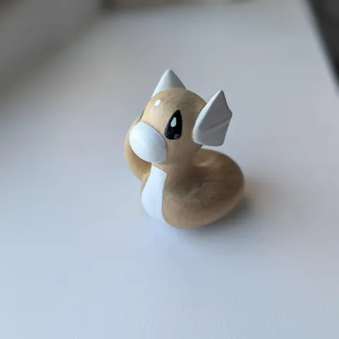 Carved a Dratini out of maple wood! [OC] 
