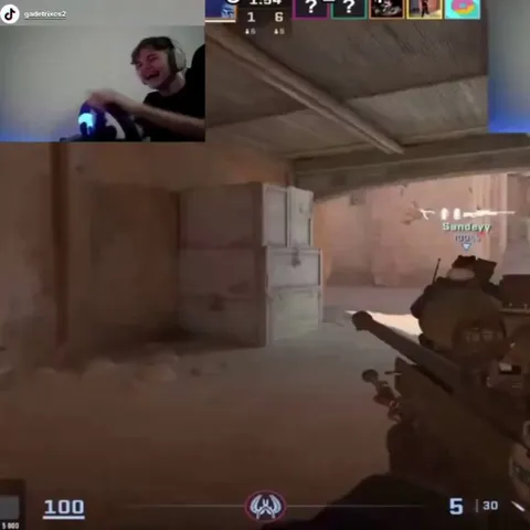This guy using a steering wheel to play Counter Strike