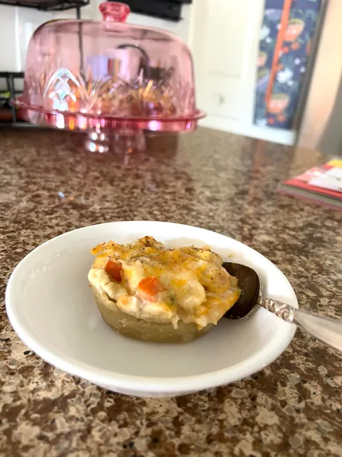 Baking and making snowflakes while my girl lounges in the window 🐈‍⬛💛