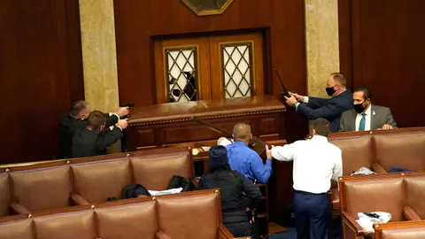 U.S. capitol security defending the main hall from Trump voters during the Jan 6th insurrection.
