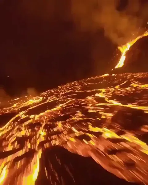 Drone soaring trough erupting volcano