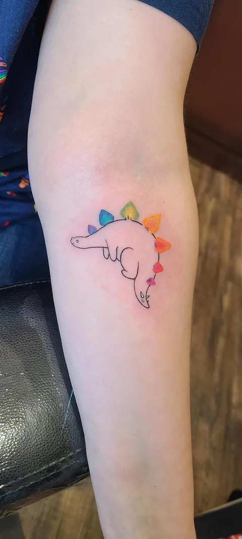 Got a cute derpy dino done by Mary Kasa at The Gremlin House in Jenison, Michigan.
