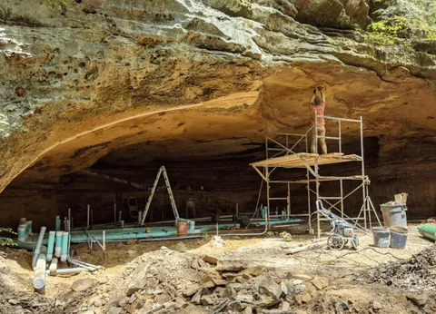 Is building under a huge rock like this safe? My first thought when I say this was earthquakes.