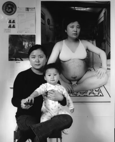 A mother photographs herself and her child over the years, 2001