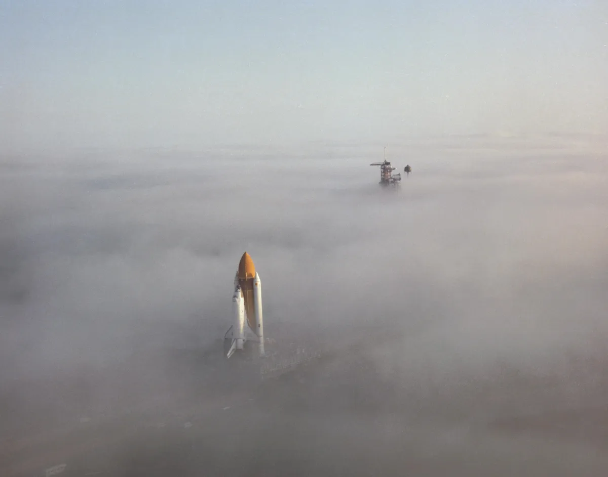 Space Shuttle Challenger crawling through fog [3055x2400]