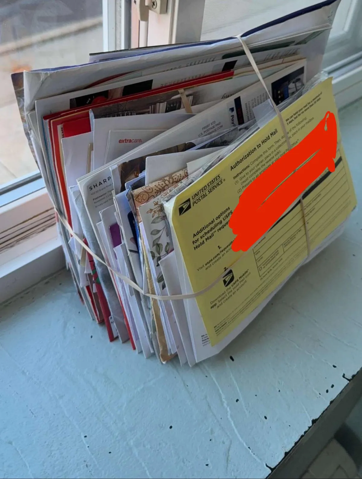 Mailman clearly had enough,left the entire building’s mail in one bundle like it was a group project