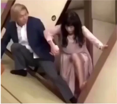 A Japanese game show where contestants serve tea in a tilted restaurant