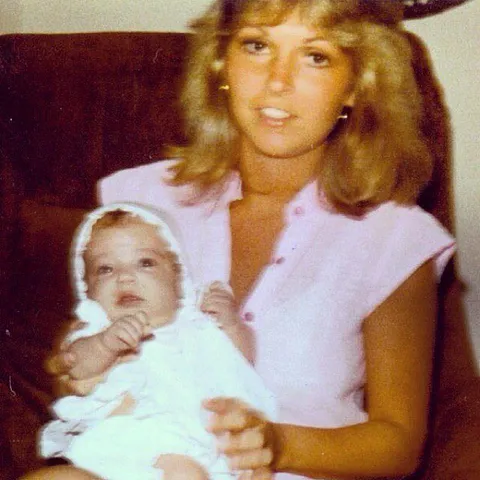 My Mom holding baby me in 1986.