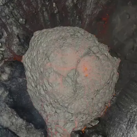 🔥 Drone footage looking down into a volcanic eruption from above