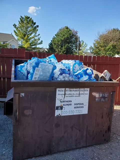 Dumpster full of Water Bottles