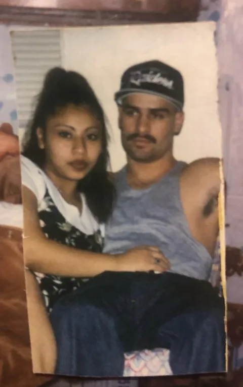 Dad in the 90s rocking a Los Angeles Raiders hat