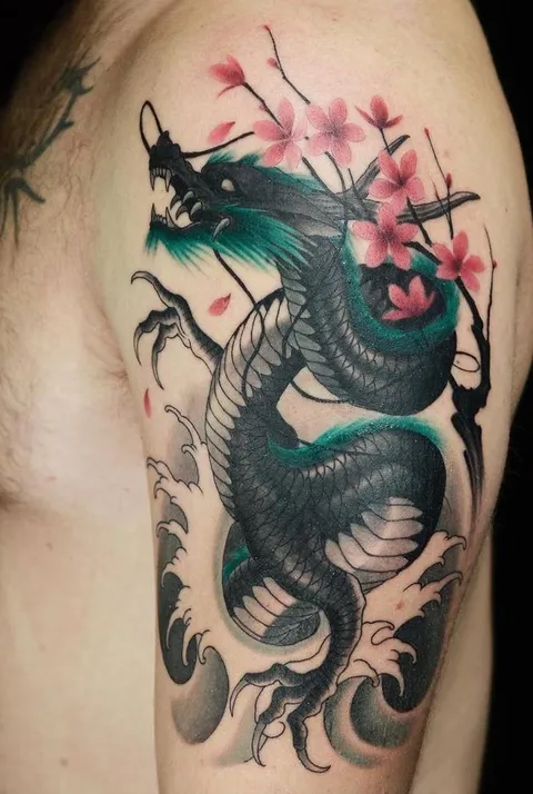 Still in awe of how much I love this piece. Third tattoo: Dragon with waves and sakura done by Eiji Fujisawa at Studio Muscat in Shibuya, Tokyo.