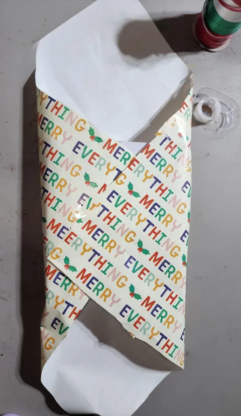 If you cut your wrapping paper to small, Try turning the gift 45 degrees!