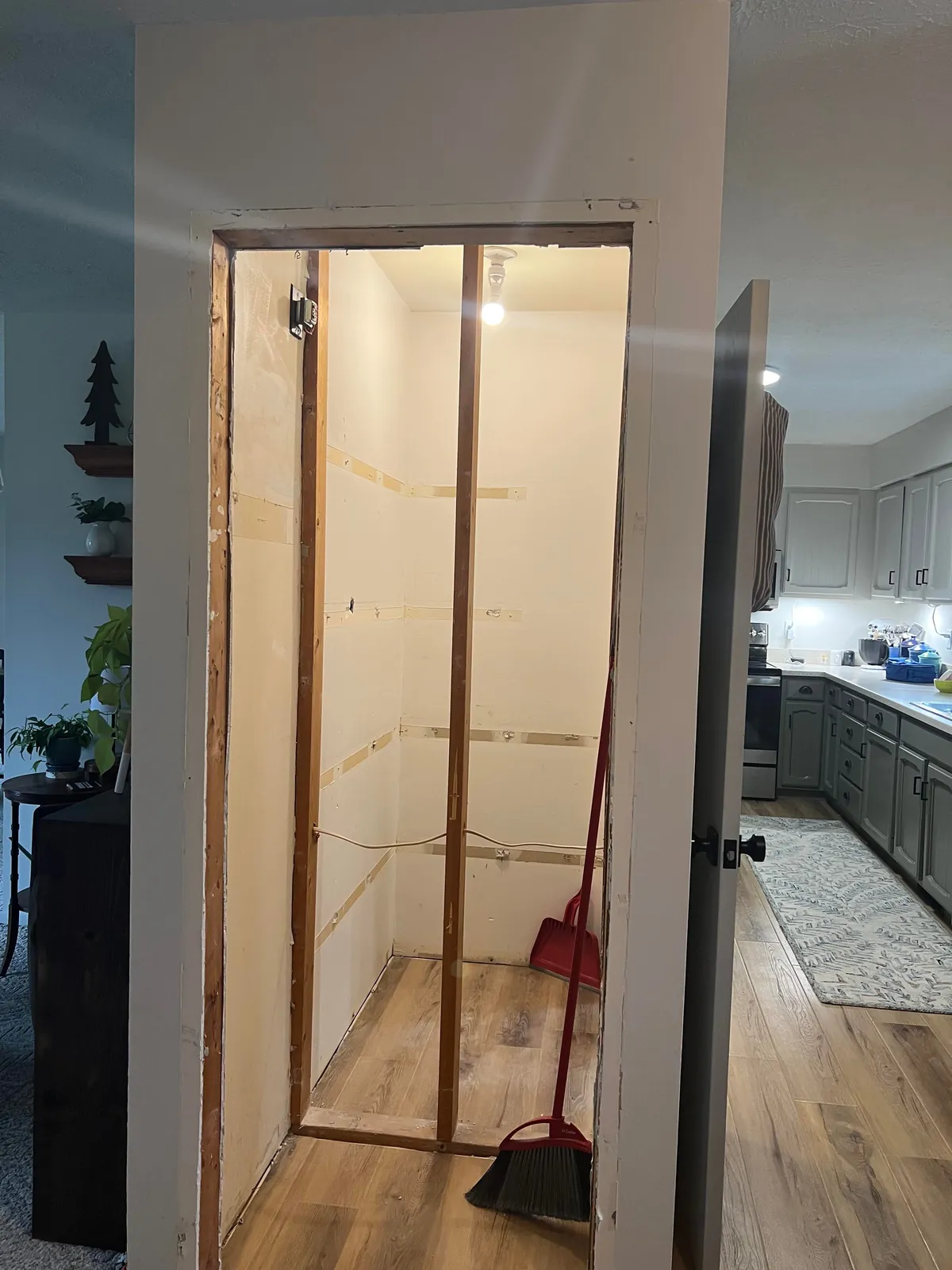 Reclaimed unused coat closet for pantry expansion